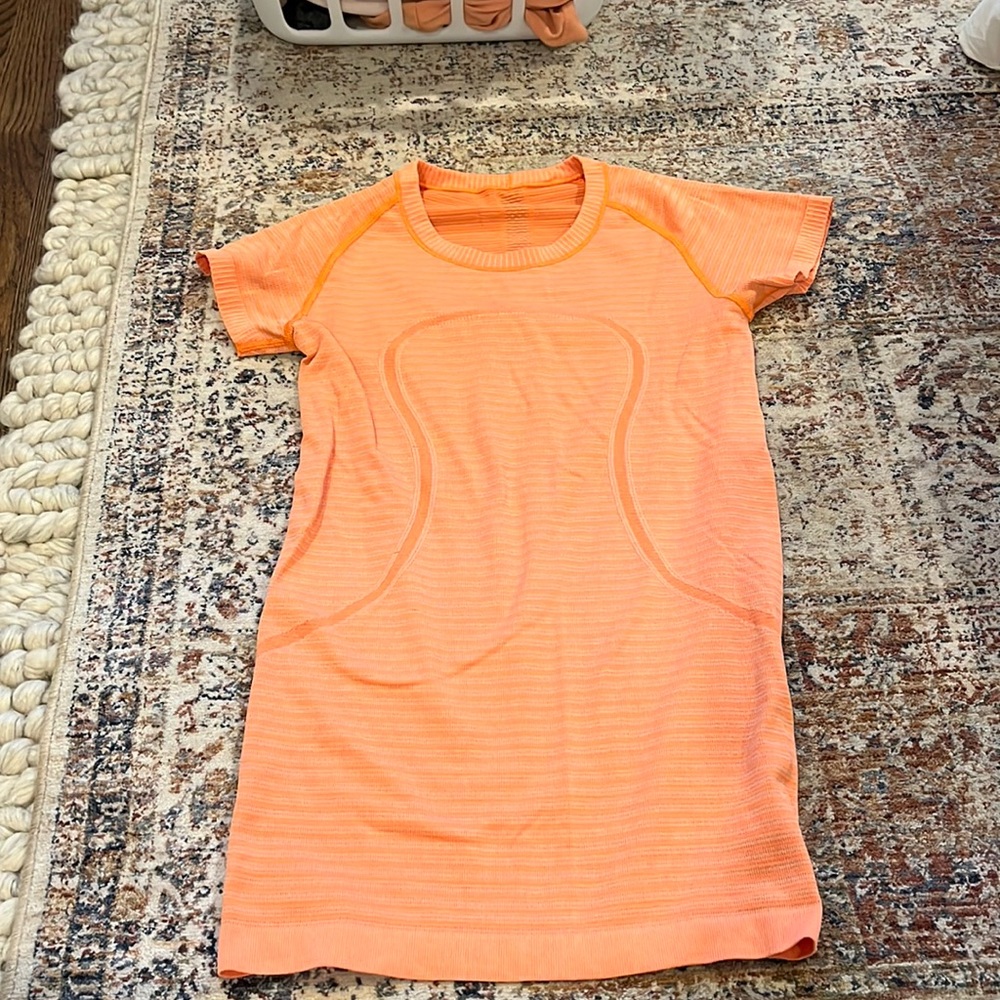 Orange Lululemon swiftly tech top-perfect condition!